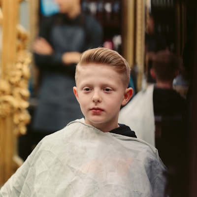 Child receiving a haircut